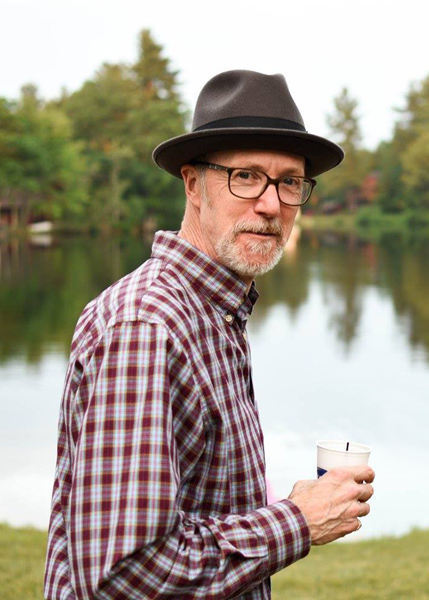 Mark Frederick Fisher relaxes at home